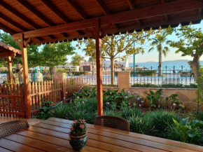 Villa by the beach with garden